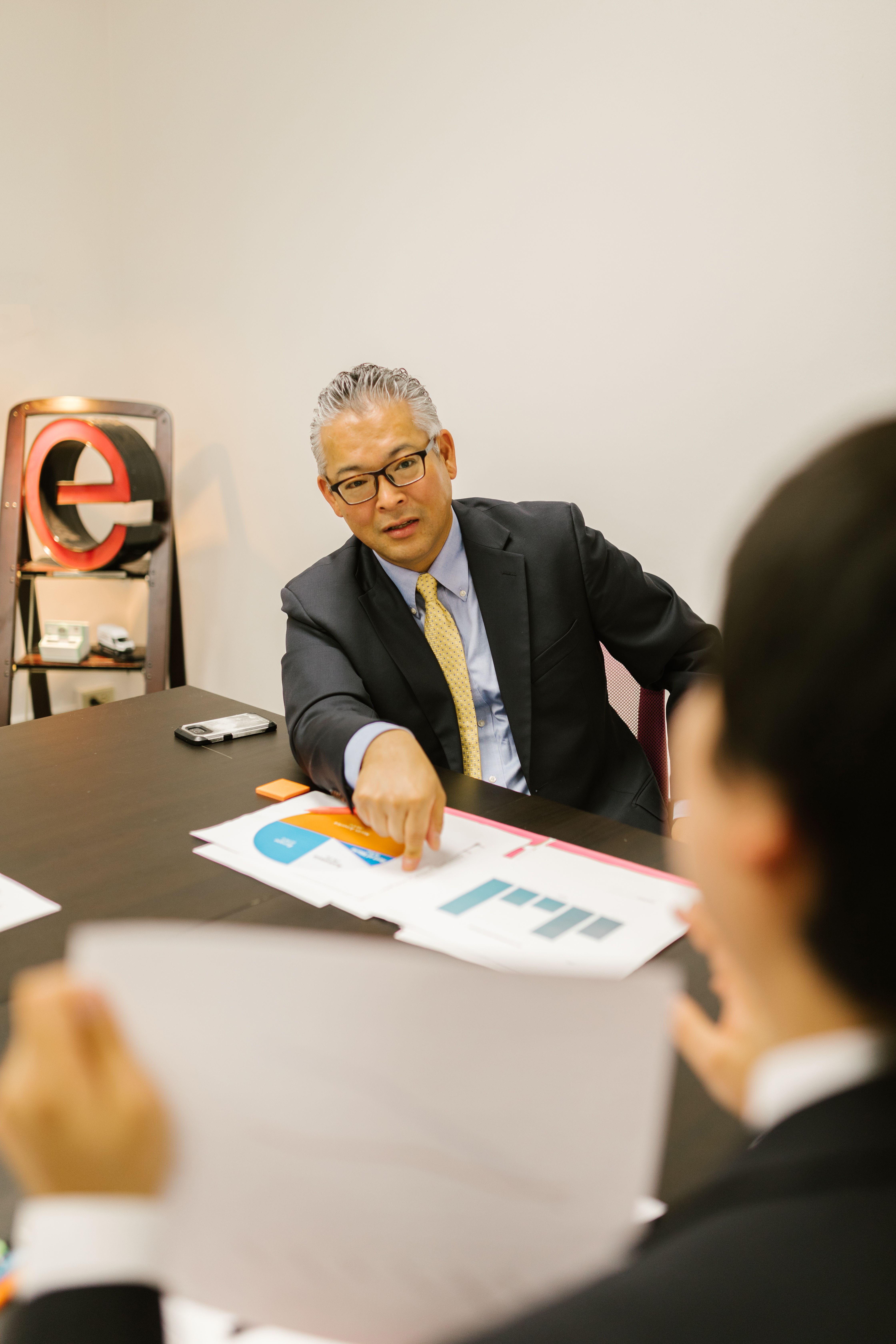 Advisor discussing a business planning document